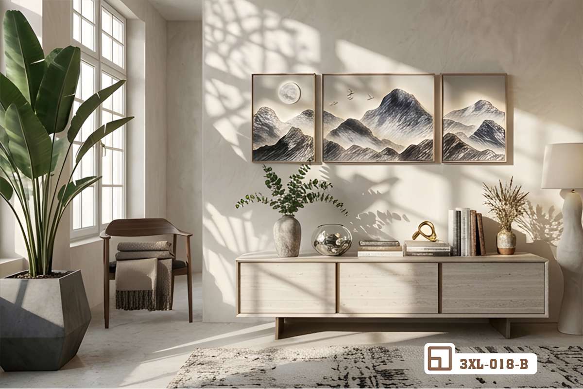 Bộ tranh núi non trùng điệp bài trí cùng kệ tivi trắng và chậu cây cảnh Bộ ba tranh phong cảnh núi non tone xám trang trí phòng khách cạnh cây xanh nội thất