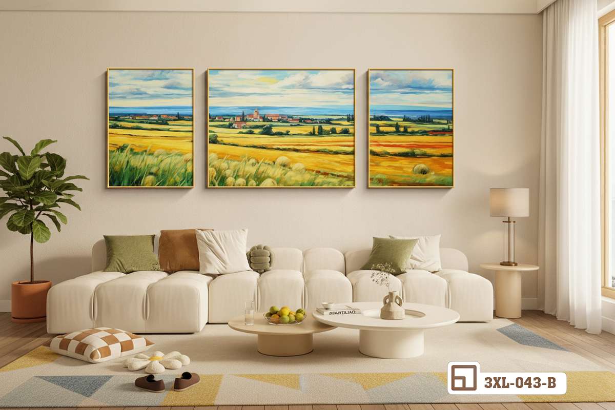 bộ tranh đồng quê treo trên ghế sofa trắng phòng khách rộng Bộ ba bức tranh phong cảnh đồng quê treo trang trọng trên mảng tường sau ghế sofa trắng phòng khách rộng rãi