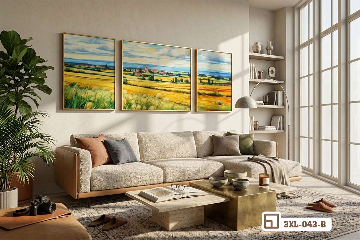 tranh phong cảnh đồng quê trang trí tường phòng khách gỗ sáng Bộ tranh phong cảnh đồng quê trang trí phòng khách nổi bật với mảng tường trắng và đồ nội thất gỗ sáng màu