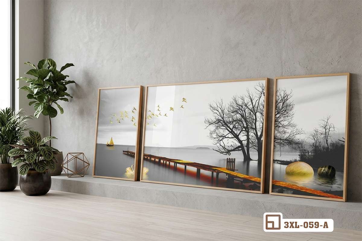 tranh phong cảnh hoàng hôn treo sát sàn nhà cạnh chậu cây xanh phong cách tối giản Bức tranh phong cảnh hoàng hôn đặt dưới sàn nhà cạnh chậu cây xanh trong không gian nội thất tối giản