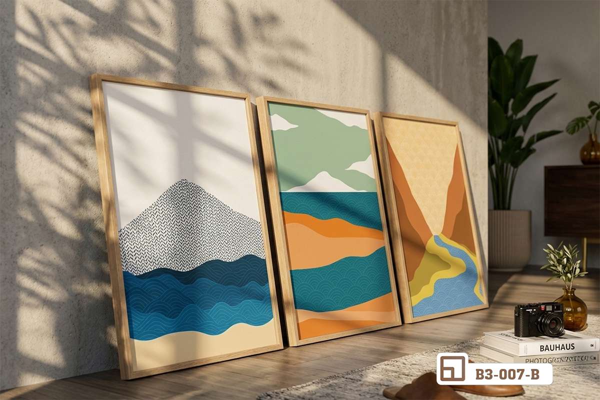 bộ tranh phong cảnh biển tối giản dựng sẵn phòng khách Bộ ba tranh canvas phong cảnh biển tối giản dựng sát bức tường trắng trong phòng khách tràn ngập ánh sáng tự nhiên