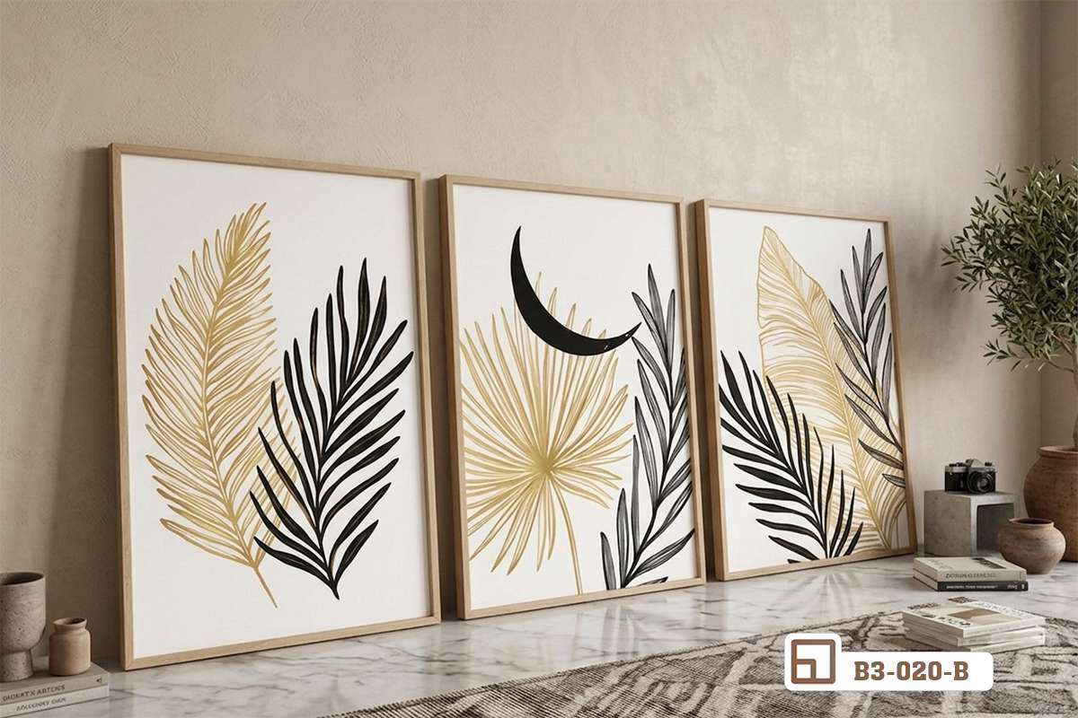 tranh lá cây tối giản đặt tựa trên sàn nhà phối thảm trải sàn Bộ tranh lá cây tối giản đặt sát sàn nhà phối cùng thảm lông mềm mại và cây xanh trang trí